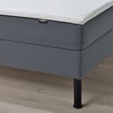 Bed frame with legs showing, designed by ikea.