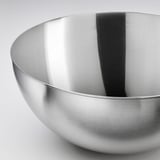 Shiny stainless-steel bowl; smooth, reflective surface; deep, rounded shape.