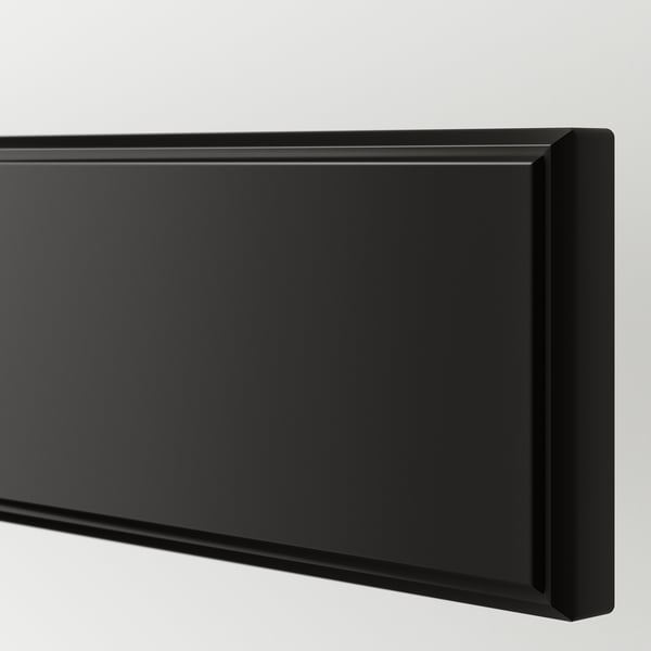 Black drawer front with smooth, lacquered surface and beveled edges, showcasing sleek design and quality finish.