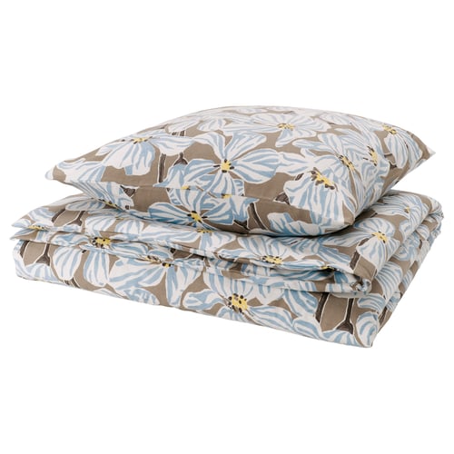 Folded floral bedding, BÖNTRÄD, light blue and beige, soft square shapes, 100% recycled cotton.