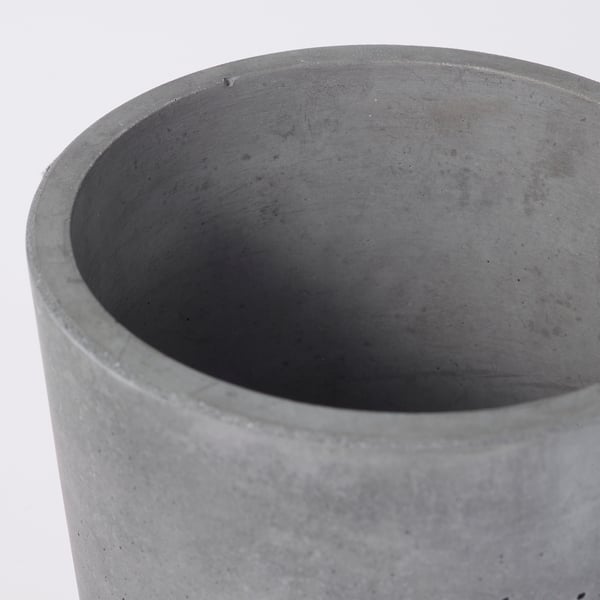 Large, round, gray concrete planter, smooth texture, minimalist design.