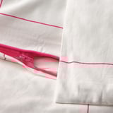 White duvet cover set with pink zippers and lines, showing zipper detail. Smooth cotton-viscose blend.