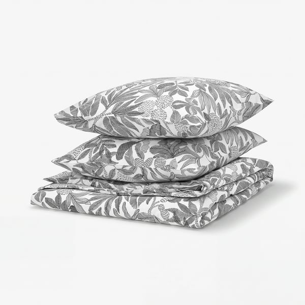 A stack of BROKDRACENA bedding in grey. A floral pattern, recycled polyester, smooth fabric.
