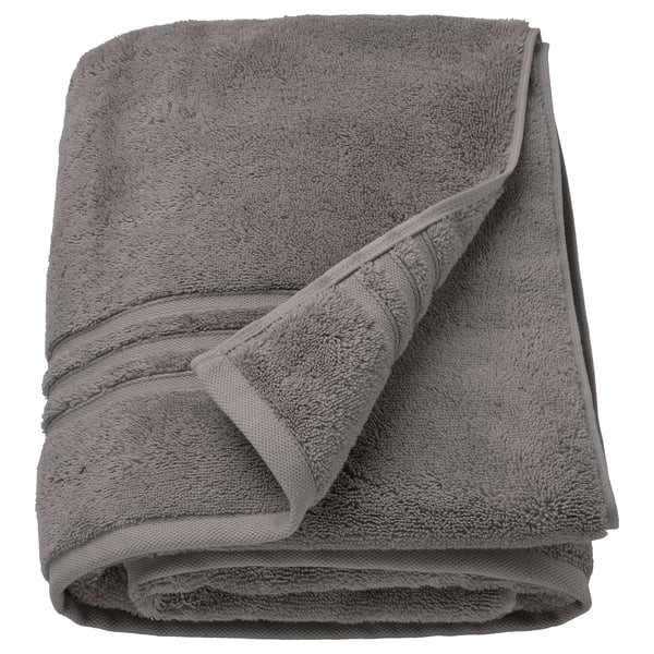 Gray BROKGLIM organic cotton towel, folded, soft with woven border.