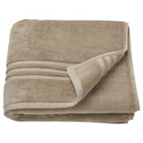 BROKGLIM towel, beige, organic cotton, folded with a decorative border.