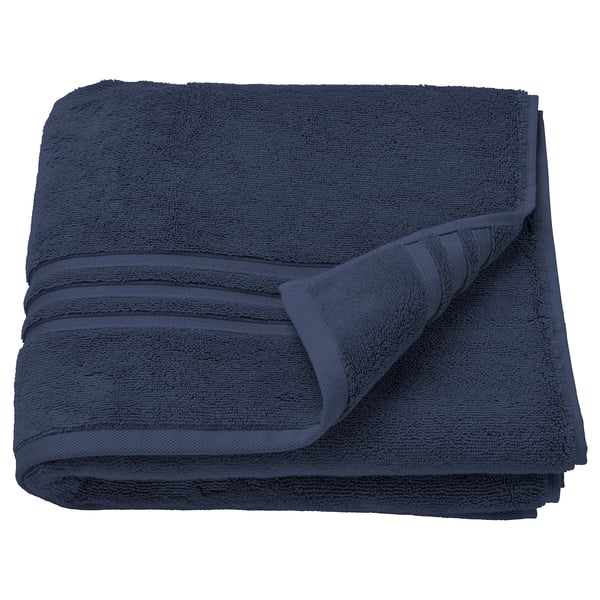Deep blue folded BROKGLIM organic cotton towel, thick and soft with woven border design.