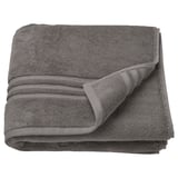 A neatly folded, dark grey BROKGLIM towel made of 100% organic cotton, featuring a woven border and square shape.