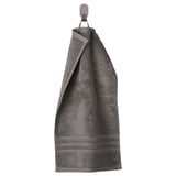 BROKGLIM grey organic cotton towel with woven border hangs neatly on hook.