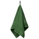 Green BROKGLIM organic cotton towel with striped border hangs neatly.