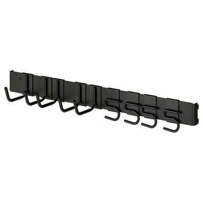 Black metal storage rail with multiple hooks for organizing tools or sports equipment in a garage or storage room.