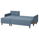 A blue BRUKSVARA l-shaped sofa-bed with built-in storage and wooden legs. It is perfect for small spaces and easily converts into a bed.