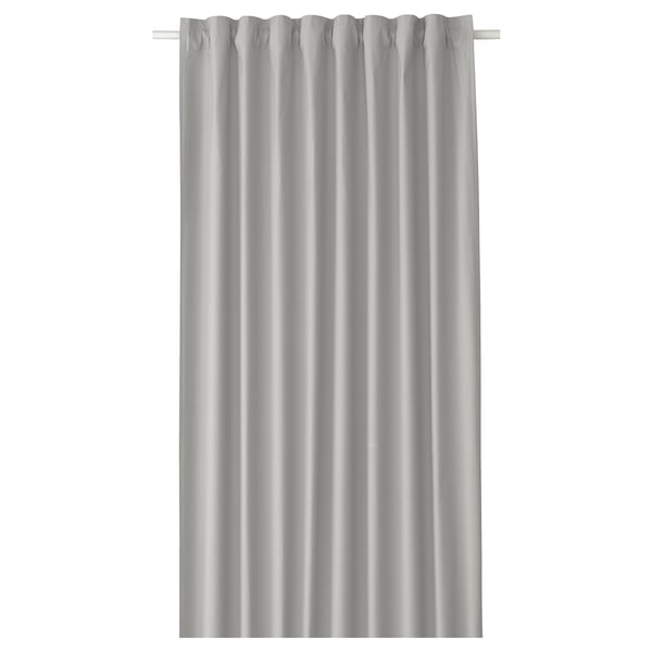 Single room-darkening curtain in light grey. Made from recycled materials, simple design.