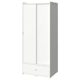 White BRUKSVARA wardrobe with rail, shelf, drawer, & hooks for versatile storage.