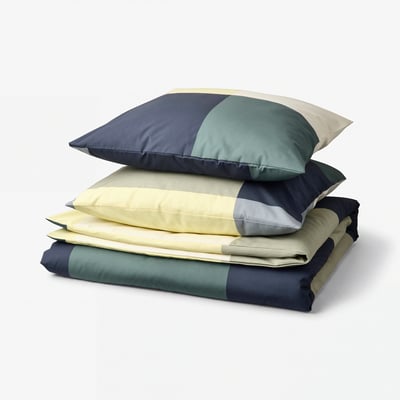 BRUNKRISSLA duvet cover set, yellow-green-blue squares, cotton/viscose, neatly folded, with two pillows.