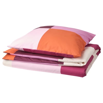 BRUNKRISSLA duvet set, orange and pink squares, cotton-viscose, folded neatly.