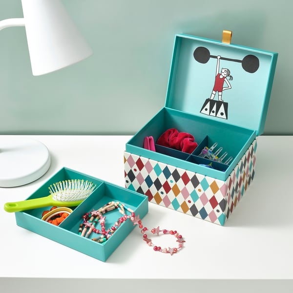Decorative box with compartments, cartoon lifter lid, brushes, bracelets.