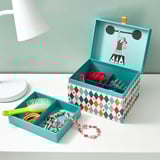 Decorative box with compartments, cartoon lifter lid, brushes, bracelets.