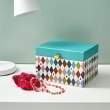Colorful box with lid, perfect for storing jewelry and accessories. Shallow and deep compartments visible.