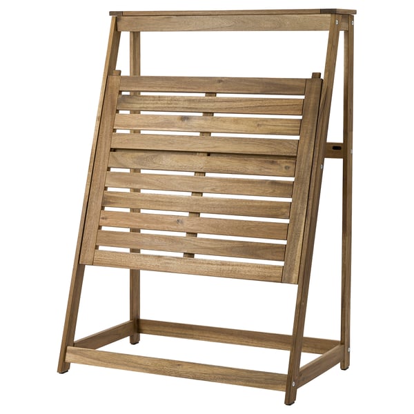 DJUPÖN foldable acacia table: brown, rectangular, slatted design, perfect for small spaces.
