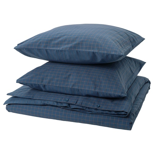 A folded blue chequered cotton DOFTAKLEJA duvet cover with buttons, zipped pillowcases, and corner pockets.