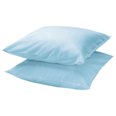 Two sky-blue DVALA pillows stacked, rectangular shape, smooth satin finish, 100% cotton.