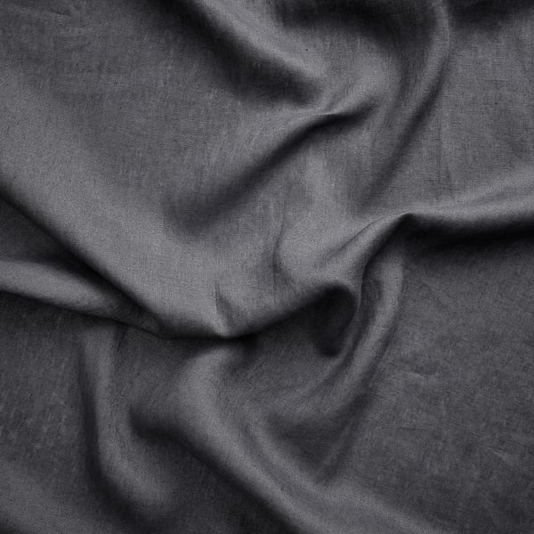 Dark grey linen curtains, textured, draped, natural folds, soft yet firm, breathable fabric.