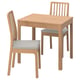 Modern wooden dining set with oak table and two upholstered chairs.