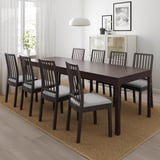 EKEDALEN dark brown extendable dining table with 6 light grey cushioned chairs. Large, rectangular, modern design fits well in spacious rooms.