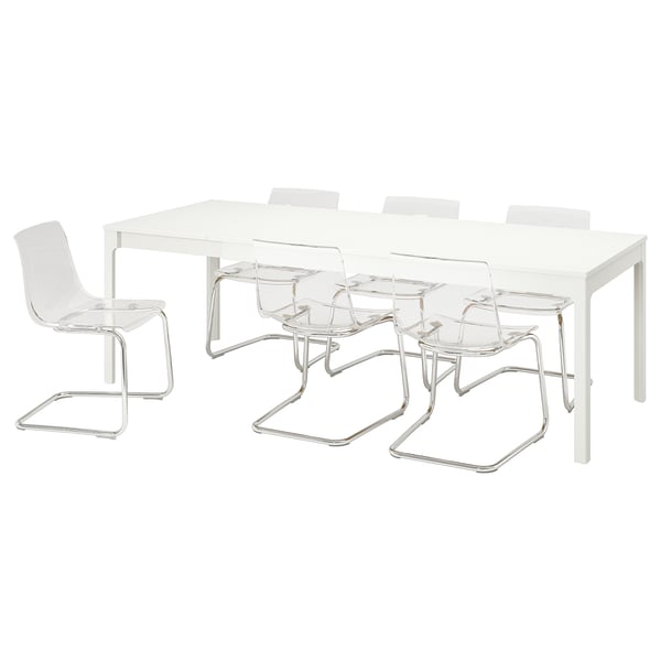 A white EKEDALEN extendable dining table with six clear chairs.