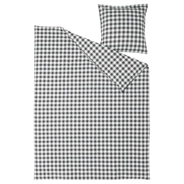 Black & white checkered duvet and pillow set in organic cotton with zipper closure.