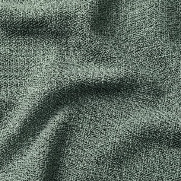 Close-up of textured, grey fabric, showing weave and folds.