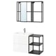 Modern bathroom set-up featuring white floating vanity, black metal shelves, and a black-framed mirror with sliding doors.