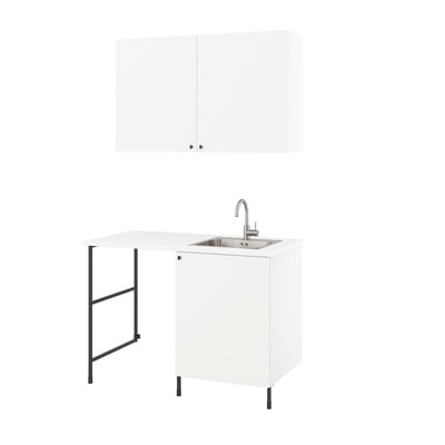 Modern white ENHET laundry unit with sink, storage, and black metal accents.