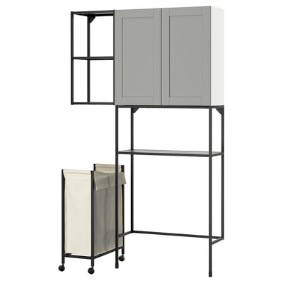 A gray ENHET storage unit with shelves and a laundry bag on wheels.