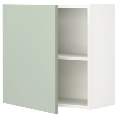 An ENHET wall-mounted cabinet in sage green, with a simple rectangular shape and a single shelf inside.