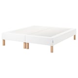 A white ESPEVÄR bed base with wooden legs, designed for support and easy cleaning.