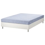 Light blue & white mattress set on white frame with metal legs.