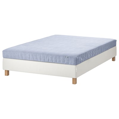 ESPEVÄR/VADSÖ bed in blue, featuring bonnell springs for comfort and stability, light wood legs, and a white base.