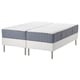 Option: Two white mattresses on a white base with metal legs, blue trim.