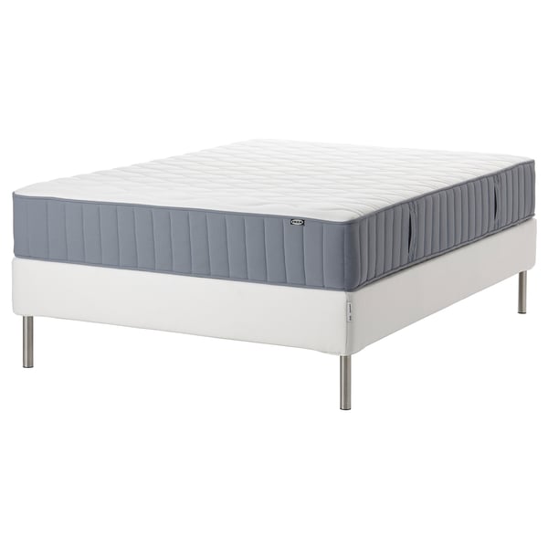 White metal bed frame with blue and white mattress, pocket springs, cotton cover.