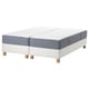 Option: New espevar/valevag bedding: two white mattresses on white base, wooden legs, modern design, supportive and comfortable.