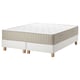 Option: A white mattress and base combo. Simple, square, upholstered with beige detailing.