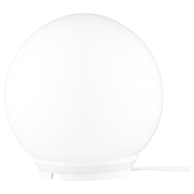A FADO table lamp with a white glass globe shade, standing on a round polypropylene base. It has a modern, minimalist design with clean lines.