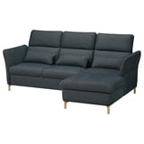 A dark blue FAMMARP sectional sofa with adjustable headrests and wooden legs.