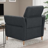 Gray FAMMARP armchair, plush, wide, with handy side table. Soft fabric, cozy, & comfy.