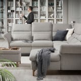 A modern living room with a FAMMARP sectional & bookcase.