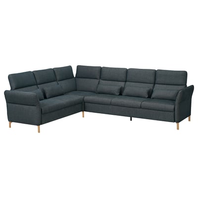 Dark gray FAMMARP corner sofa with adjustable sections, wood legs, cozy cushions.