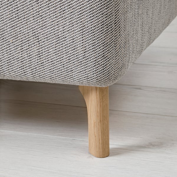 Modern sofa with chic wooden legs, upholstered in textured fabric. Blends comfort and style.