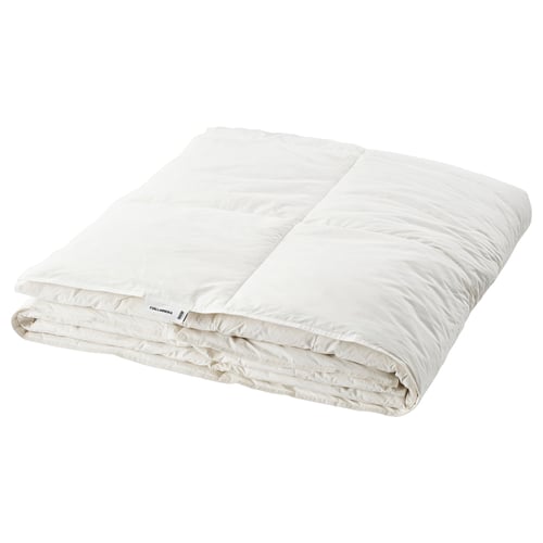 The FJÄLLARNIKA duvet in white, featuring stitched walls for warmth, filled with down and feathers, and made of cotton. Its folded neatly.