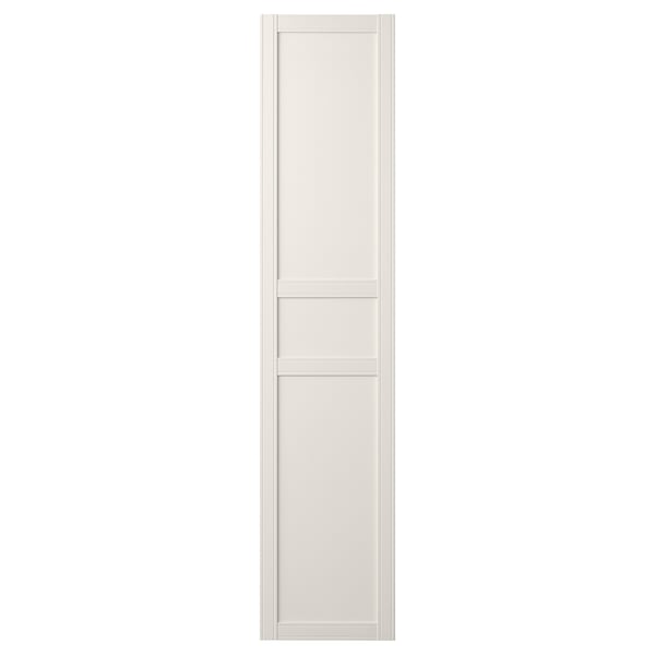 A white, tall, narrow cabinet door with three panels and subtle grooves.